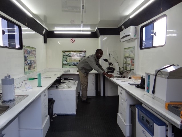 Figure 3: Evaluation of frozen/thawed semen before AI in an ARC Gametek Cryo-mobile truck laboratory on the field.